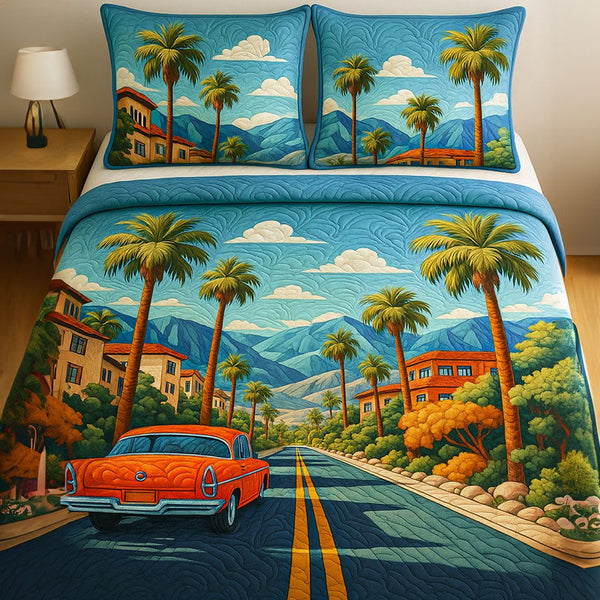 Coastal Drive quilted 3-piece bedding set on a made bed in a light coastal bedroom