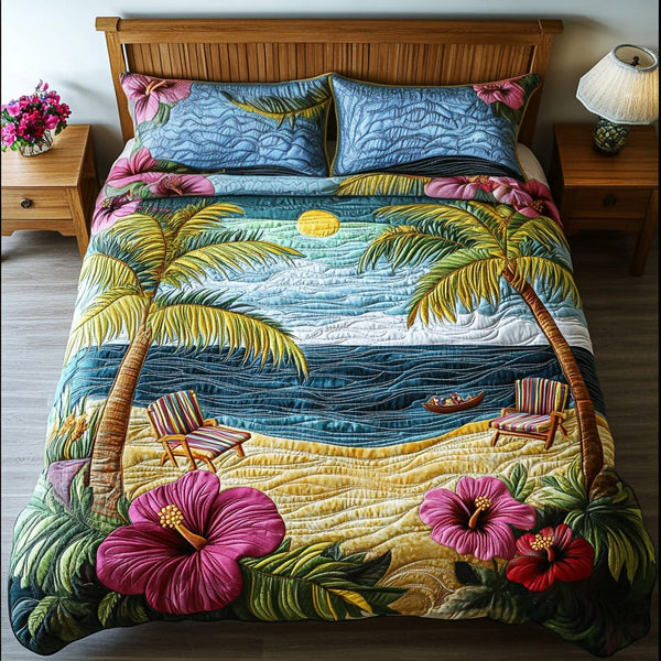 Coastal Glow quilted 3-piece bedding set on a made bed in a light coastal bedroom