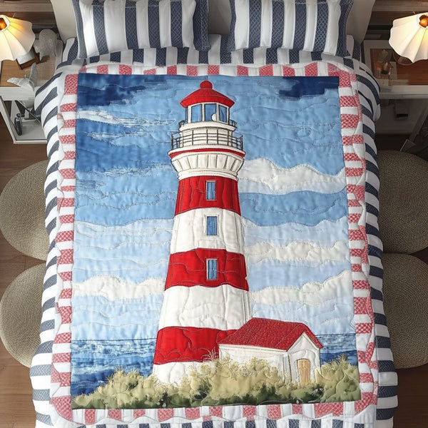 Coastal Glow quilted 3-piece bedding set on a made bed in a light coastal bedroom