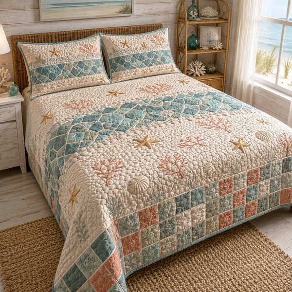 Coastal Haven quilted 3-piece bedding set on a made bed in a light coastal bedroom
