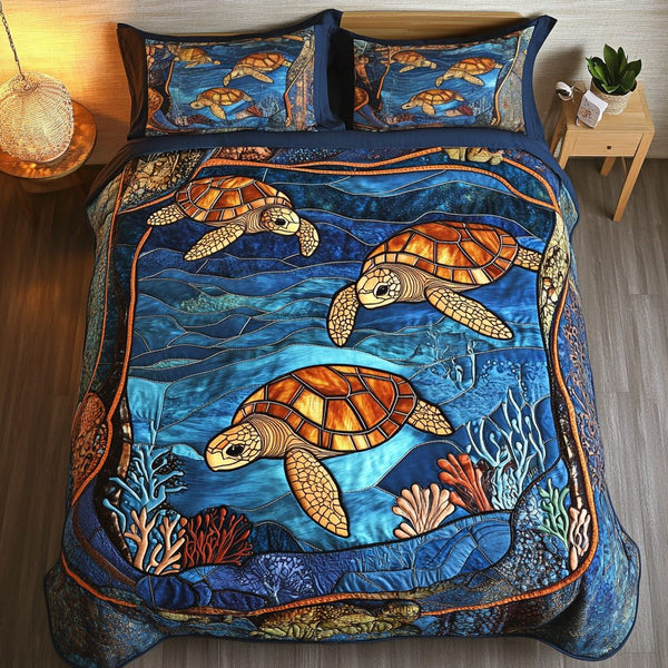 Coastal Journey quilted 3-piece bedding set on a made bed in a light coastal bedroom