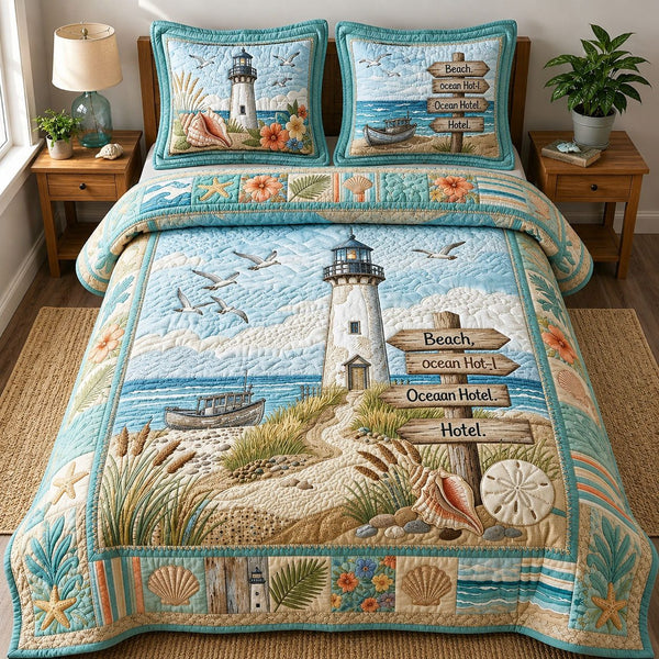 Coastal Life Lighthouse quilted 3-piece bedding set on a made bed in a light coastal bedroom