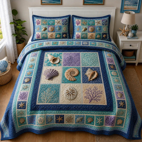 Coastal Patchwork quilted 3-piece bedding set on a made bed in a light coastal bedroom