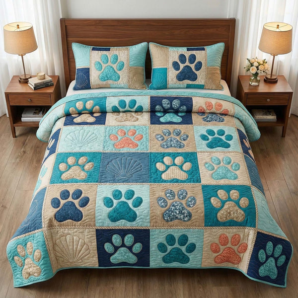 Coastal Paws quilted 3-piece bedding set on a made bed in a light coastal bedroom