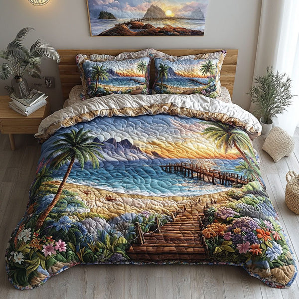 Coastal Sunset Calm quilted 3-piece bedding set on a made bed in a light coastal bedroom