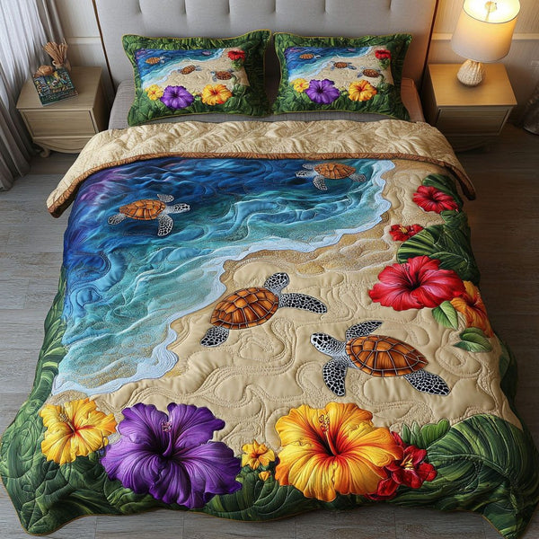 Coastal Wanderer quilted 3-piece bedding set on a made bed in a light coastal bedroom
