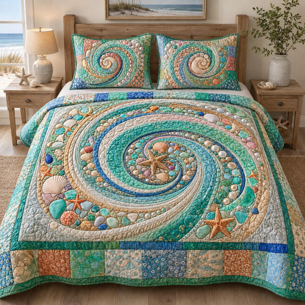 Coastal Whirl quilted 3-piece bedding set on a made bed in a light coastal bedroom