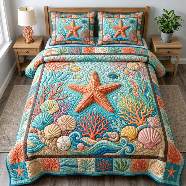 Coastal Whisper quilted 3-piece bedding set on a made bed in a light coastal bedroom