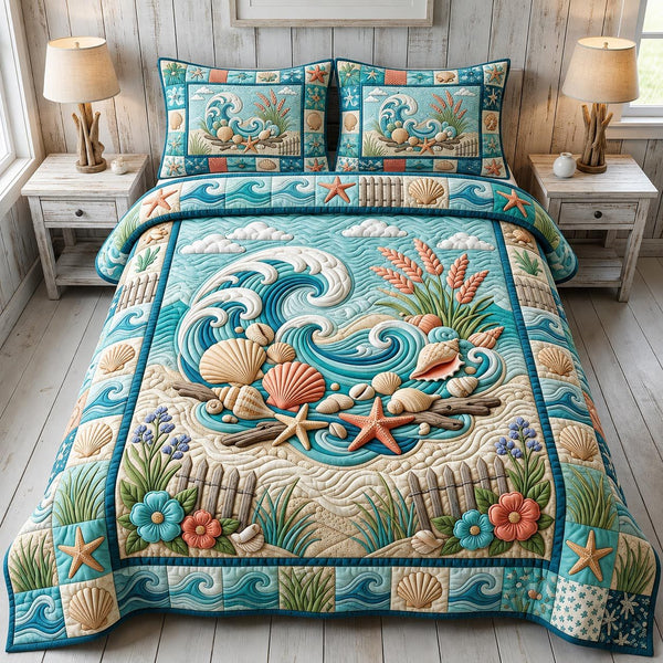 Coastal Whisper quilted 3-piece bedding set on a made bed in a light coastal bedroom