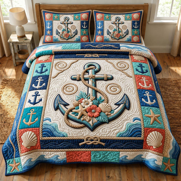 Coastal Whisper quilted 3-piece bedding set on a made bed in a light coastal bedroom