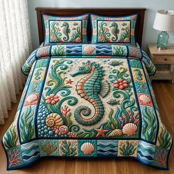 Coastal Whisper quilted 3-piece bedding set on a made bed in a light coastal bedroom