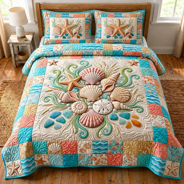 Coastal Whisper quilted 3-piece bedding set on a made bed in a light coastal bedroom