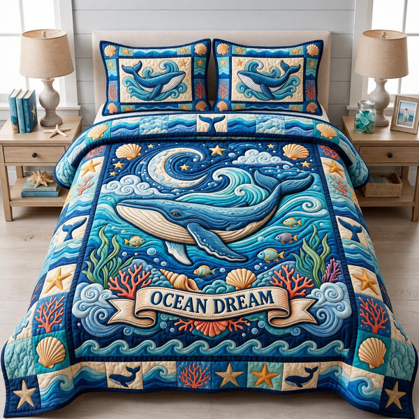 Coastal Whisper quilted 3-piece bedding set on a made bed in a light coastal bedroom