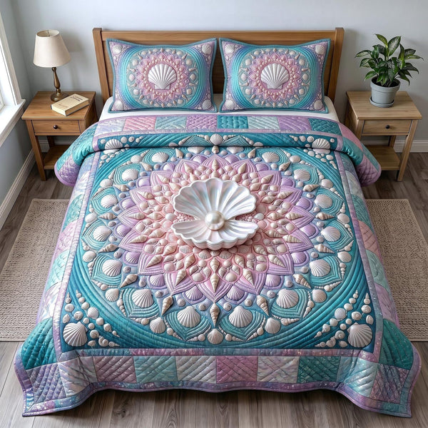 Coastal Whisper quilted 3-piece bedding set on a made bed in a light coastal bedroom