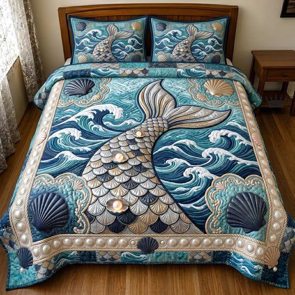 Coastal Whisper quilted 3-piece bedding set on a made bed in a light coastal bedroom