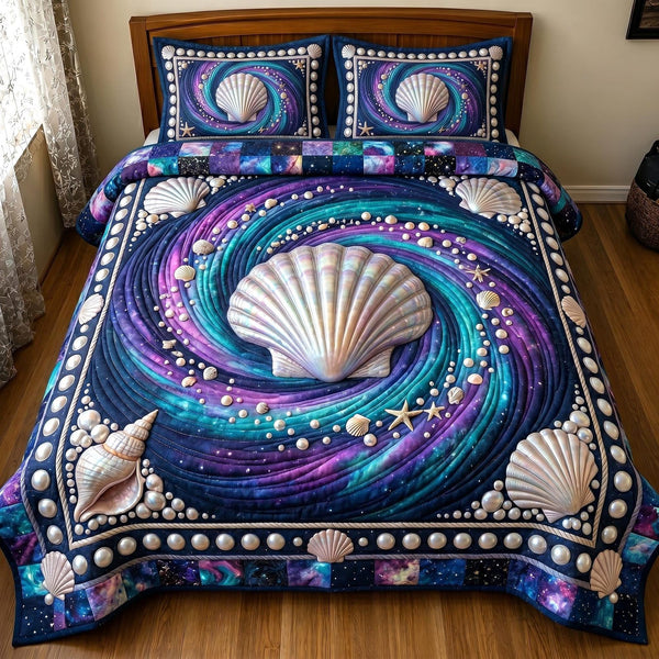 Coastal Whisper quilted 3-piece bedding set on a made bed in a light coastal bedroom