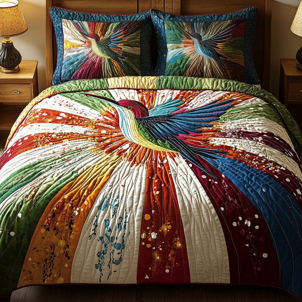 Color Breeze quilted 3-piece bedding set on a made bed with two matching pillow shams