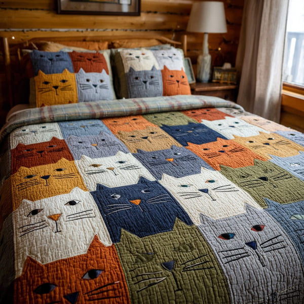 Color Cats quilted 3-piece bedding set on a made bed with two matching pillow shams