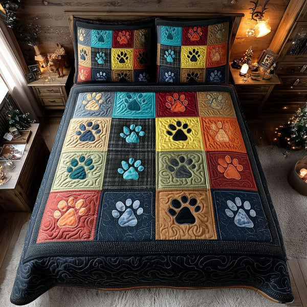 Color Paws quilted 3-piece bedding set on a made bed with two matching pillow shams
