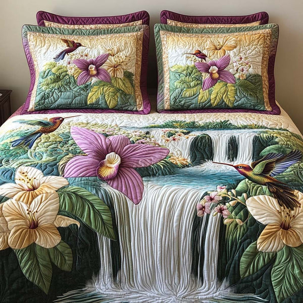 Color Whirl quilted 3-piece bedding set on a made bed with two matching pillow shams