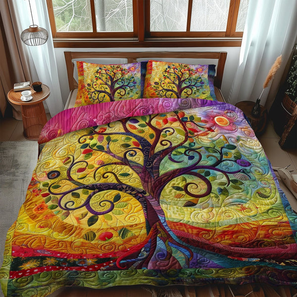 Colorburst Tree of Life quilted 3-piece bedding set on a made bed with two matching pillow shams