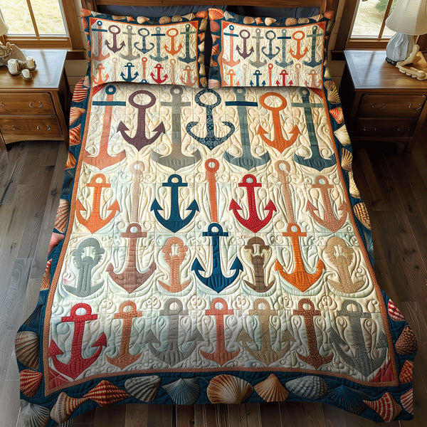 Colorful Anchors quilted 3-piece bedding set on a made bed in a light coastal bedroom