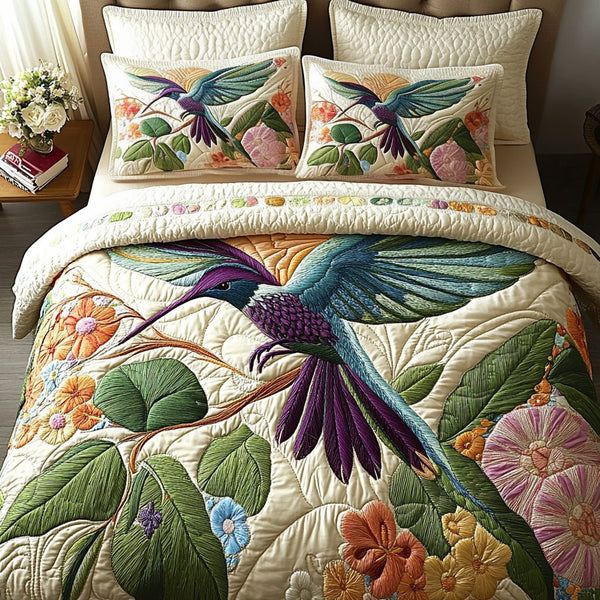 Colorful Bloom quilted 3-piece bedding set on a made bed with two matching pillow shams