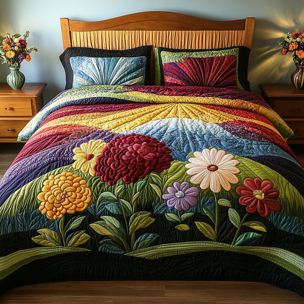 Colorful Blooms quilted 3-piece bedding set on a made bed with two matching pillow shams