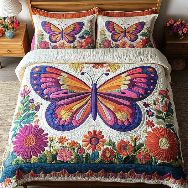 Colorful Butterflies quilted 3-piece bedding set on a made bed with two matching pillow shams