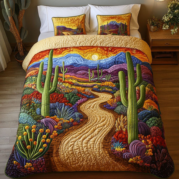 Colorful Desert Trail quilted 3-piece bedding set on a made bed with two matching pillow shams
