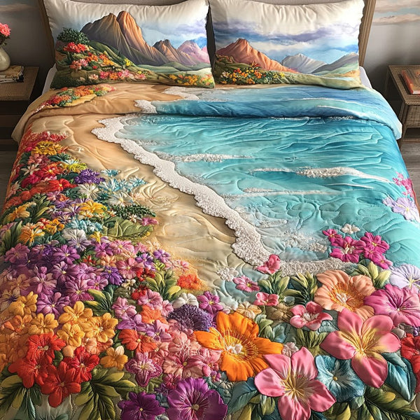Colorful Dunes quilted 3-piece bedding set on a made bed with two matching pillow shams