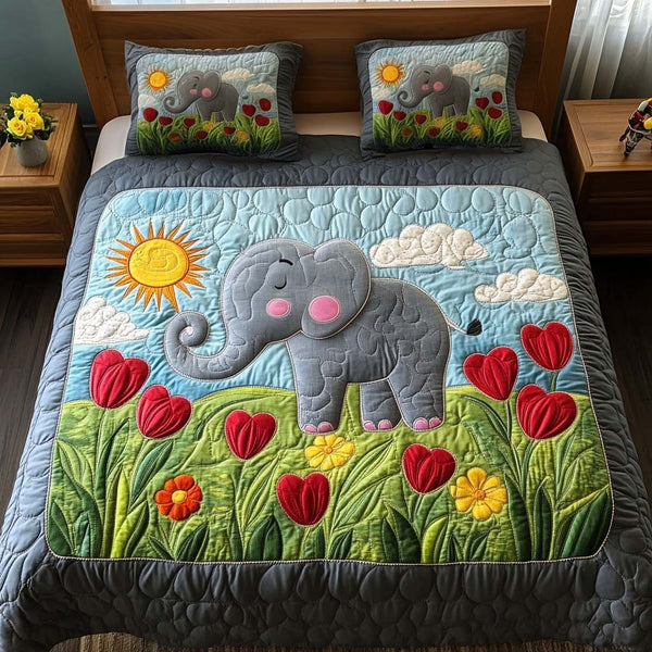 Colorful Elephant quilted 3-piece bedding set on a made bed with two matching pillow shams