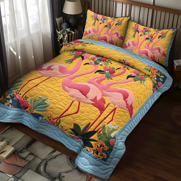 Colorful Flamingo quilted 3-piece bedding set on a made bed with two matching pillow shams
