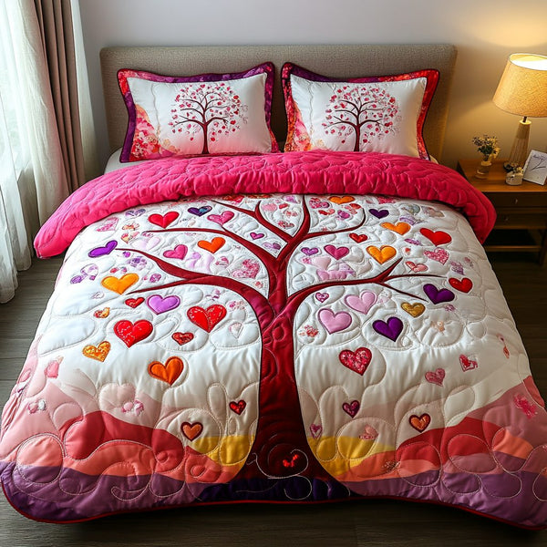 Colorful Love quilted 3-piece bedding set on a made bed with two matching pillow shams
