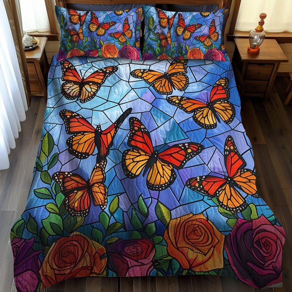 Colorful Monarch Butterflies quilted 3-piece bedding set on a made bed with two matching pillow shams