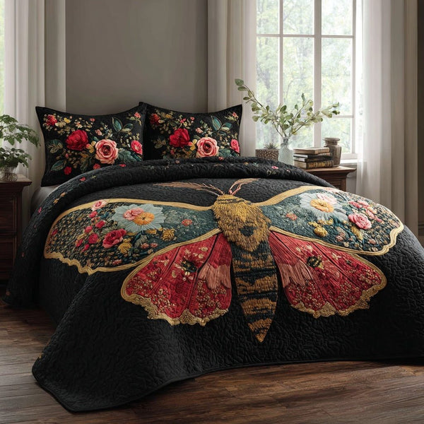 Colorful Moth quilted 3-piece bedding set on a made bed with two matching pillow shams