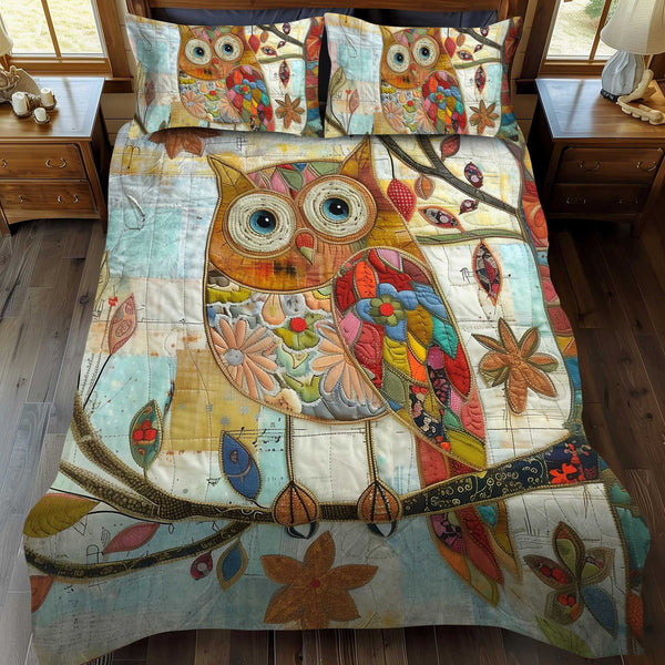 Colorful Owl Patchwork quilted 3-piece bedding set on a made bed in a farmhouse bedroom