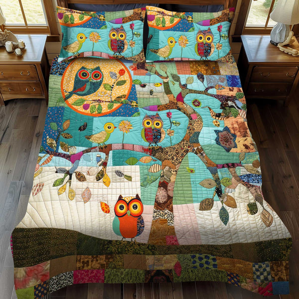 Colorful Owl Patchwork quilted 3-piece bedding set on a made bed in a farmhouse bedroom
