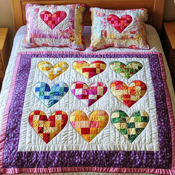 Colorful Patchwork Hearts quilted 3-piece bedding set on a made bed in a farmhouse bedroom