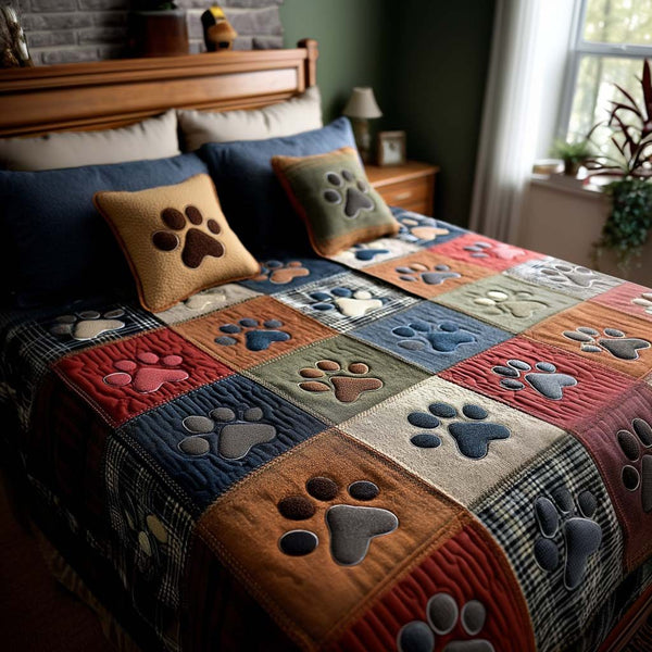 Colorful Paw quilted 3-piece bedding set on a made bed with two matching pillow shams