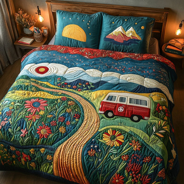 Colorful Peace Caravan quilted 3-piece bedding set on a made bed with two matching pillow shams