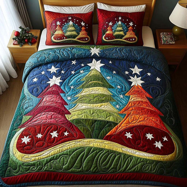 Colorful Pines quilted 3-piece bedding set on a made bed with two matching pillow shams