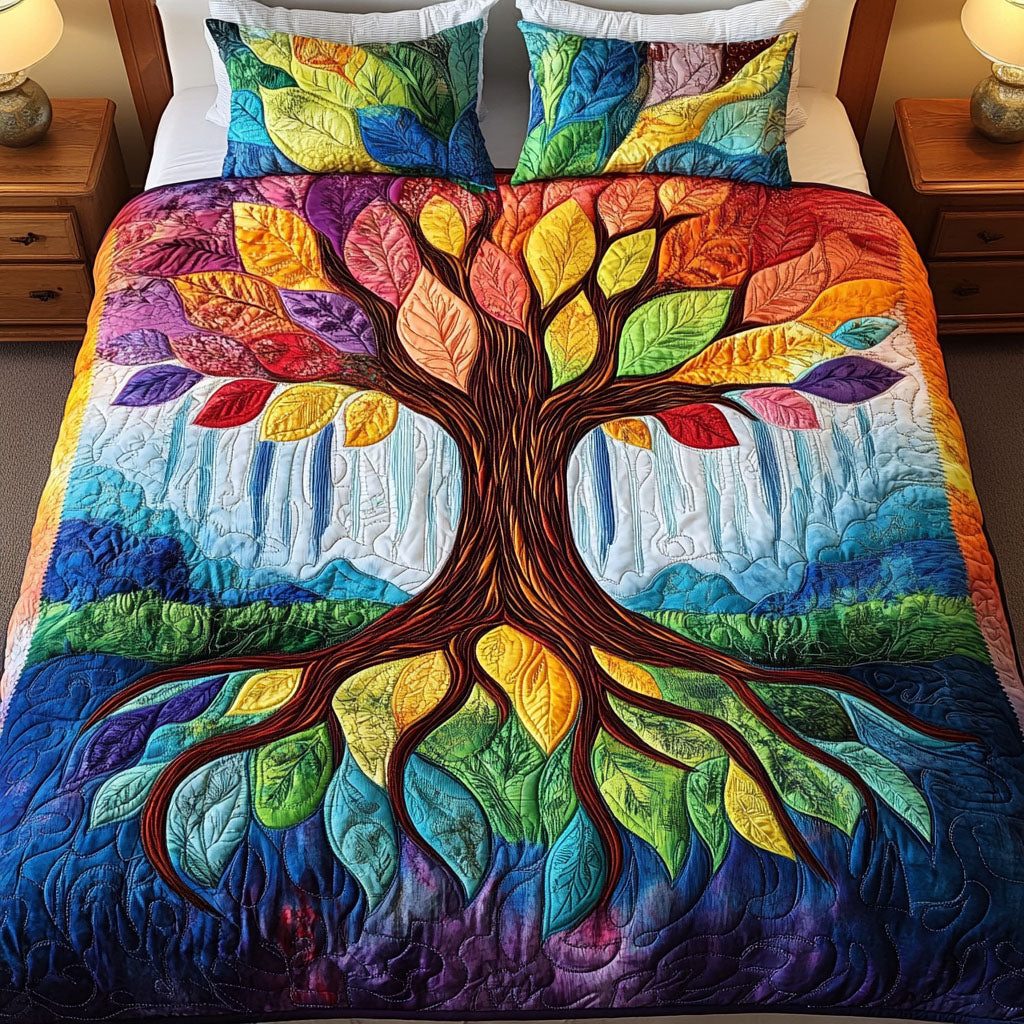 Colorful Tree of Life quilted 3-piece bedding set on a made bed with two matching pillow shams