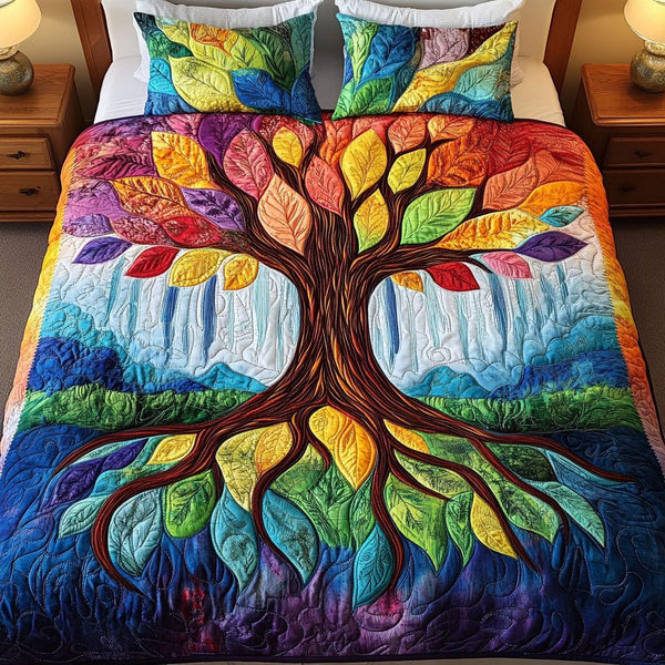 Colorful Tree of Life quilted 3-piece bedding set on a made bed with two matching pillow shams