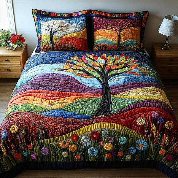 Colorful Tree Serenity quilted 3-piece bedding set on a made bed with two matching pillow shams