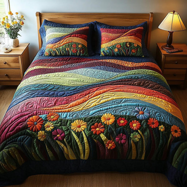 Colorful Wind quilted 3-piece bedding set on a made bed with two matching pillow shams