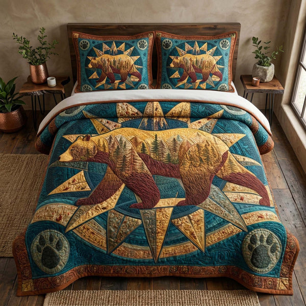 Compass Bear quilted 3-piece bedding set on a made bed with two matching pillow shams