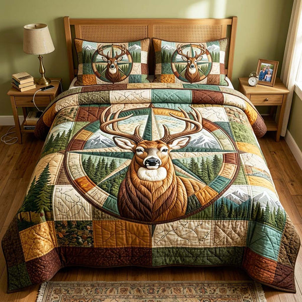Compass Buck quilted 3-piece bedding set on a made bed with two matching pillow shams
