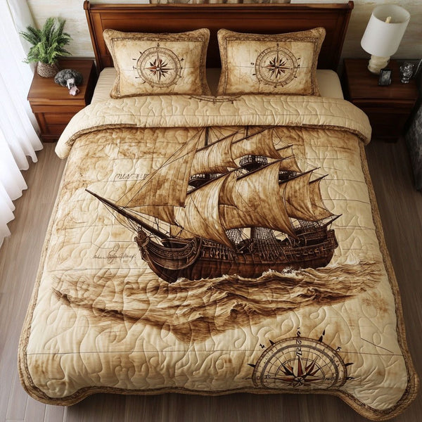 Compass Journey quilted 3-piece bedding set on a made bed with two matching pillow shams