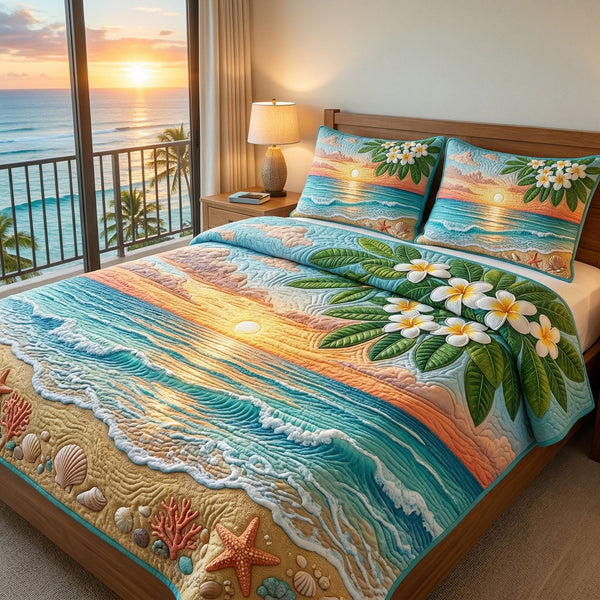 Coral Bliss quilted 3-piece bedding set on a made bed in a light coastal bedroom